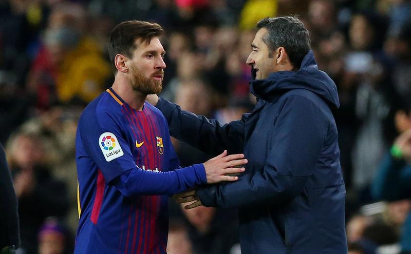 Barcelona's Lionel Messi with coach Ernesto Valverde as he is substituted. REUTERS/Albert Gea
